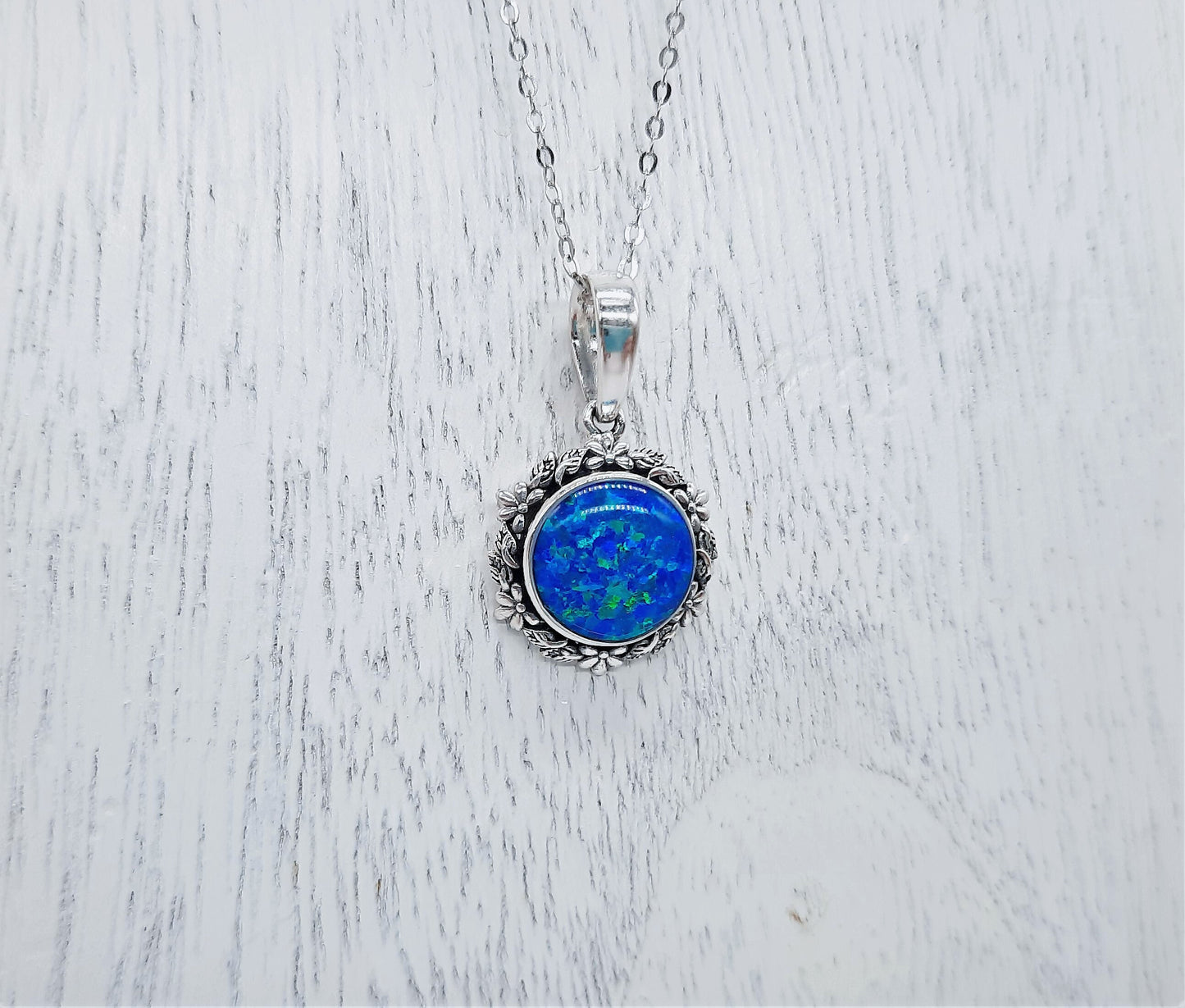 Handcrafted Iridescent Blue Opal Pendant Necklace - Flower and Leaf Design - Made with 925 Sterling Silver - Domed with Holographic Resin