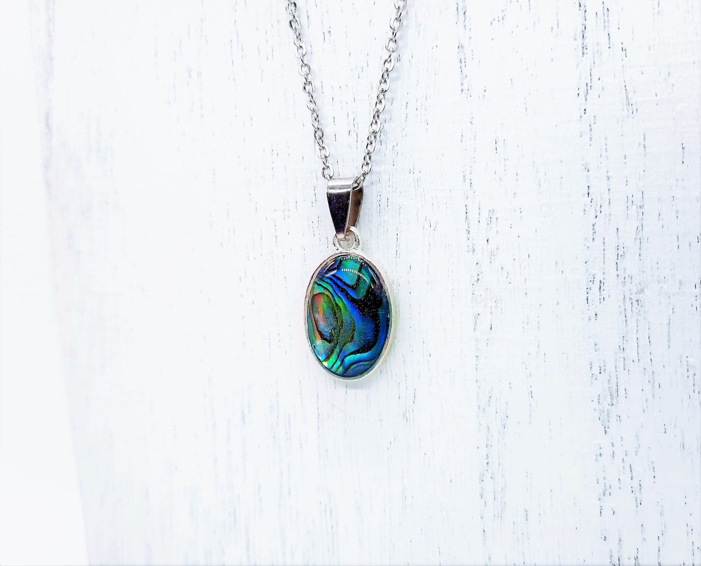 Natural Abalone / Paua Seashell Oval Pendant Necklace - Stainless Steel - Hypoallergenic - Covered w/ Holographic Powder Infused Resin Dome