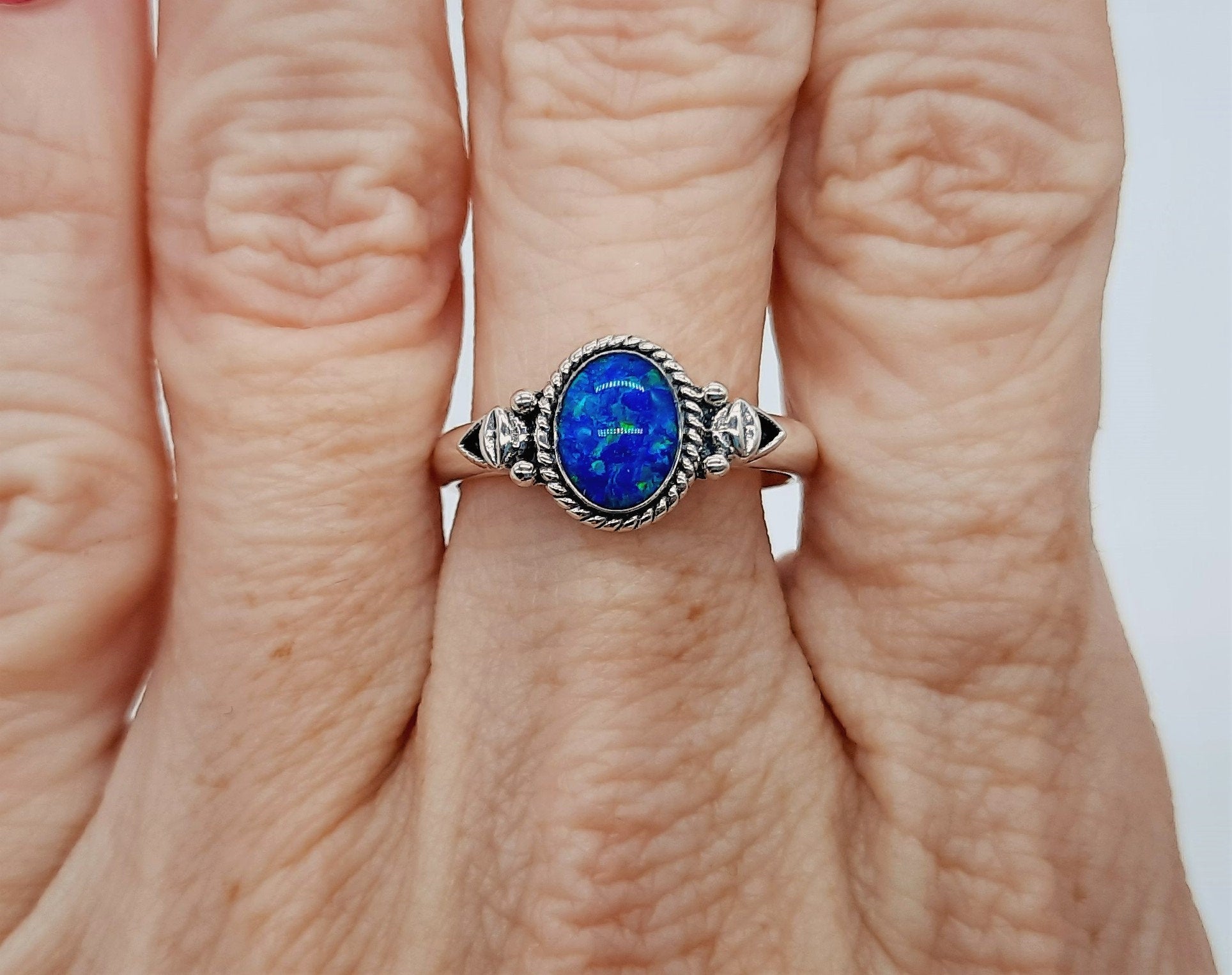 Tanzanite and blue on sale fire opal rings