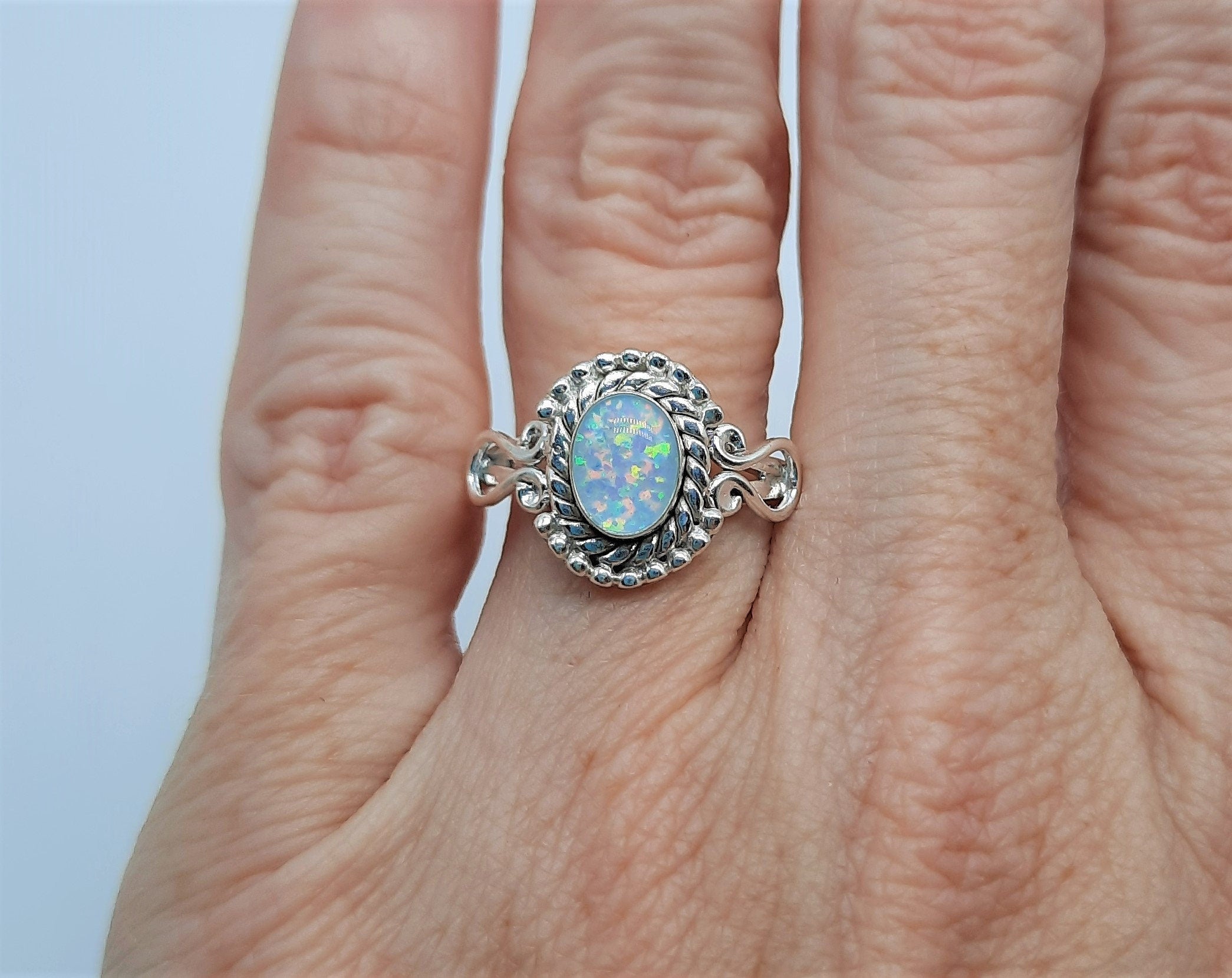 Gold rosette ring with white opal stone K14 – RNG1218 | Kotsonis Jewelry